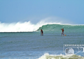 Couple SUP surfing costa rica vacation